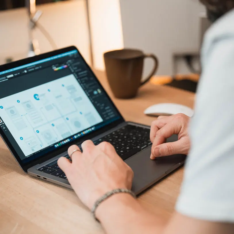 Photo of hands using a computer keyboard